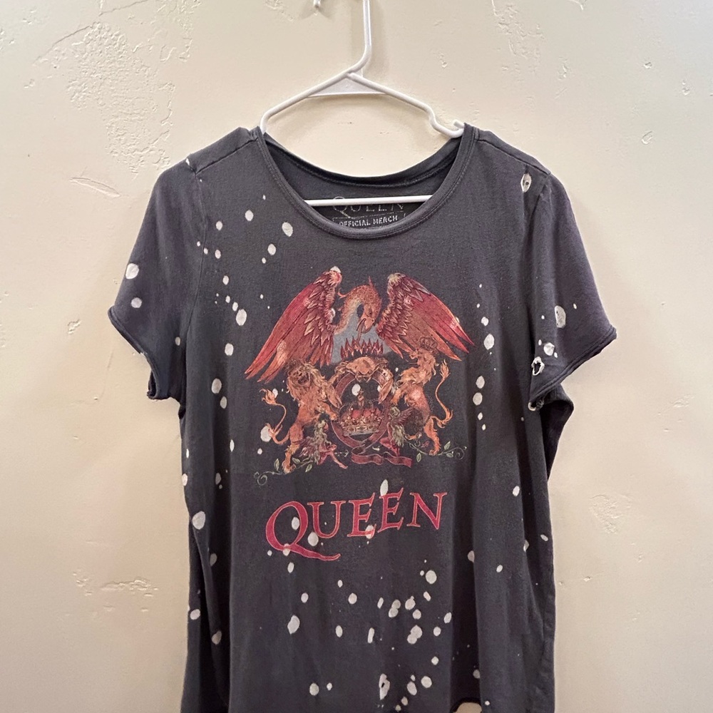 Has holes MADE LIKE THIS super soft off shoulder oversized tshirt